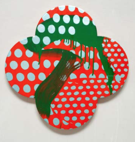 A rounded geometric shape with a red background, blue dots, and a green streak of paint.