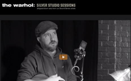 A screen capture of a website dedicated to to Silver Studio Sessions. In the center of the page is a large video featuring a man in a hat and hoodie.