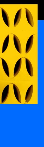 Painting that has blue in the background and black along the top of a group of yellow star-like block sculptures surround by a circle.