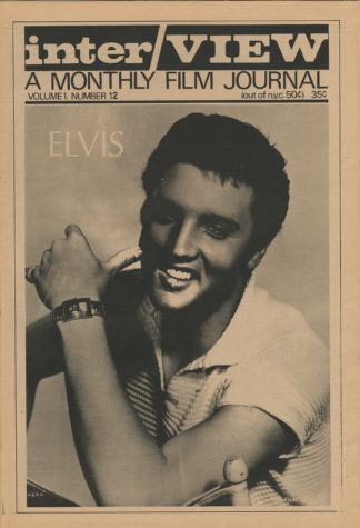 Front cover of Interview magazine that has a black and white photograph of Elvis Presley on the front smiling with his left arm up near his face and his thumb touching his right cheek. It says "Elvis" in white print overlaid on the background of the photo. At the top of the cover, above the photo, it says, "Interview A Monthly Film Journal Volume 1, number 12 (out of NYC. 50¢) 35¢".