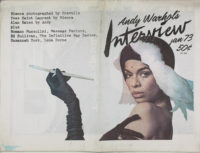 Front horizontal cover of Interview magazine that has a color photograph of Bianca Jagger on the front with her left arm up near her face holding a cigarette holder. She is wearing long, black gloves and a black hat with white feathers and the see-through fishnet veil on the hat covering her face. At the top, right of the cover, above the photo, it says, "Andy Warhol's Interview Jan 73 50¢". On the top left of the cover, it says, "Bianca photographed by Scavullo Yves Saint Laurent by Bianca Alan Bates by Andy Plus Romano Mussolini, Massage Parlors, Ed Sullivan, The Definite Ray Davies, Susannah York, Lena Horne"
