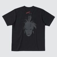 Black t-shirt featuring a white graphic print of Andy Warhol's self portrait artwork with chaotic hair with Andy Warhol's signature above in pink and "X X" below in gray.