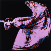 Screenprint of a ballet dancer by Andy Warhol depicted in dynamic motion with a flowing costume in purple, set against a dark background.