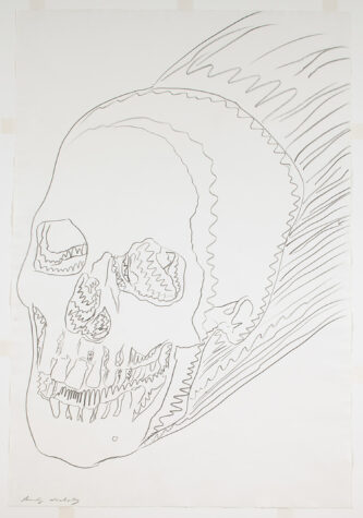 Artwork by Andy Warhol featuring a large, hand-drawn skull in a simplistic outline style on a plain background.